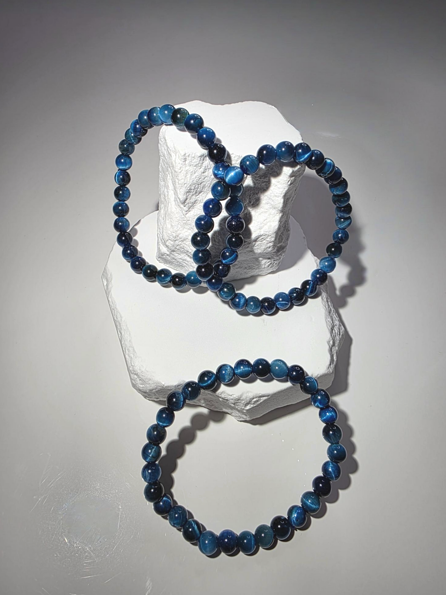 Blaues Tigeraugen Armband - schimmernde Perlen Schutzstein blau-gold
