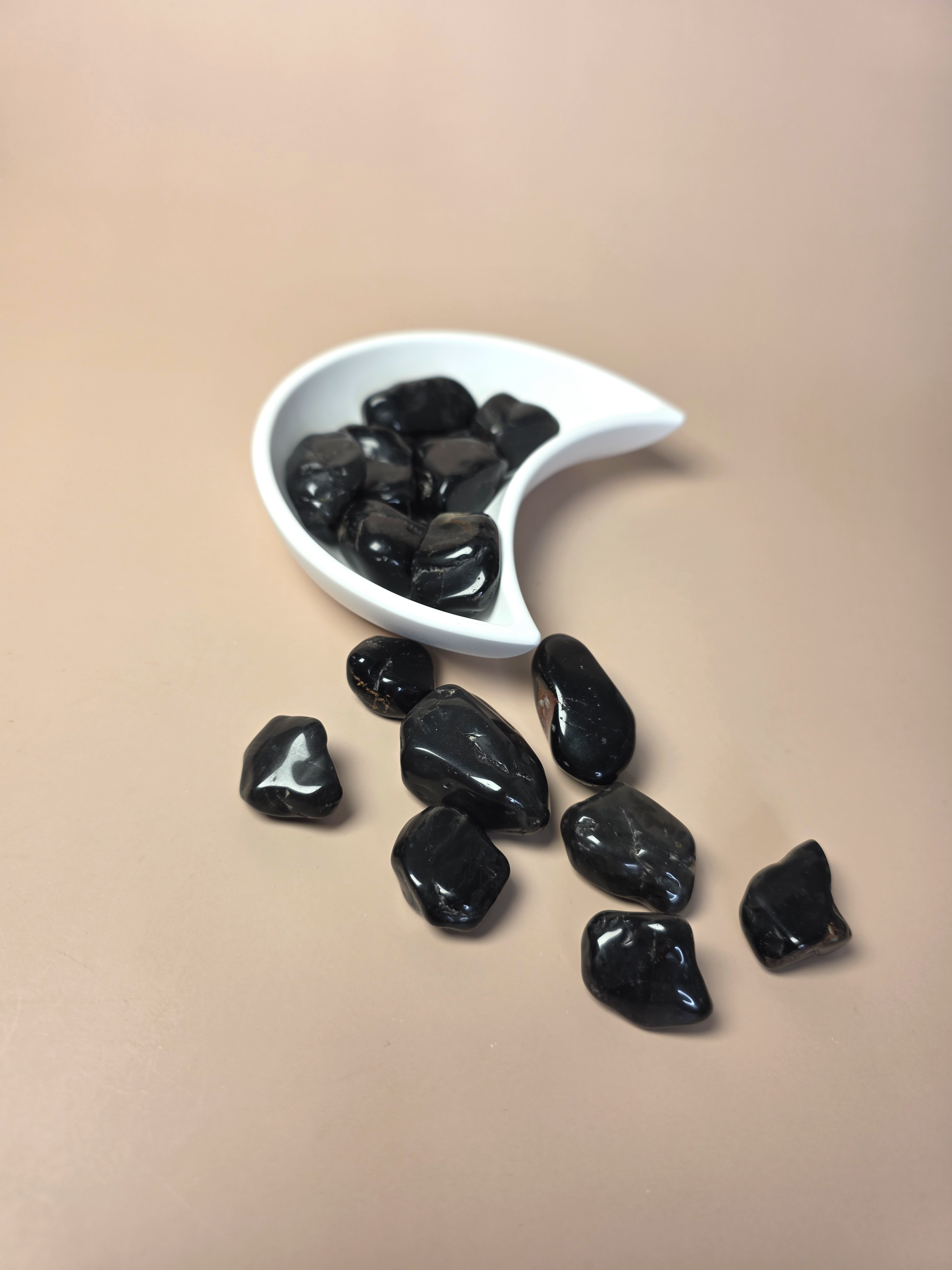 Onyx Trommelstein schwarz - polierter Schutzstein kraftvoll
